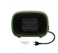 Green mini PTC ceramic fan heater showing compact size and metal mesh front grille.