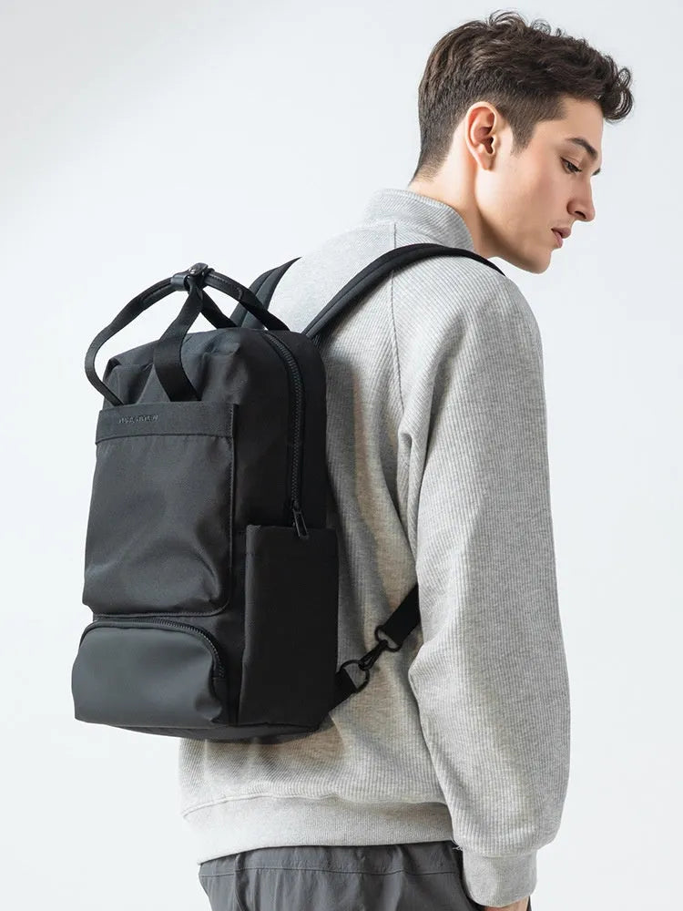 Elegant black Oxford cloth computer backpack with 20-35L capacity and polyester lining
