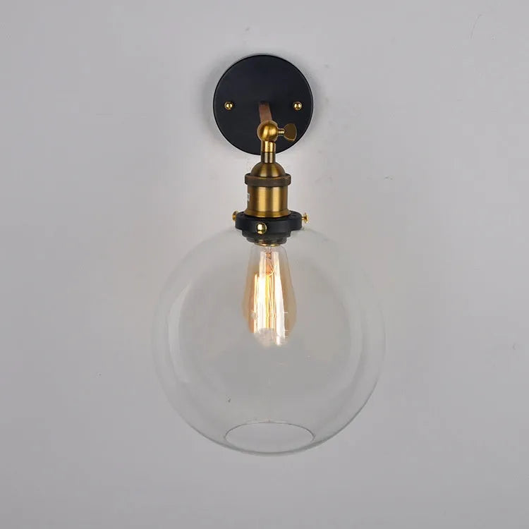 20cm round glass ball wall lamp in amber, smoke grey, or transparent on aluminium holder.
