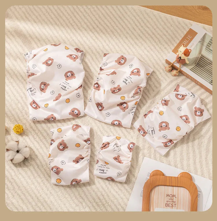 Reusable male dog diaper belly band with cartoon paw print design and elastic waistband