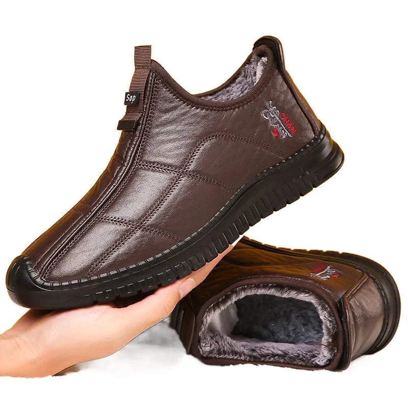 Men's brown winter cotton boots with a buckle fastening and a thick sole.