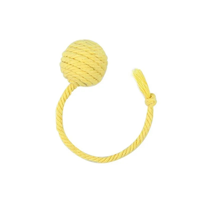 Interactive cat toy ball with rope and internal bell in green, pink, purple and yellow colours