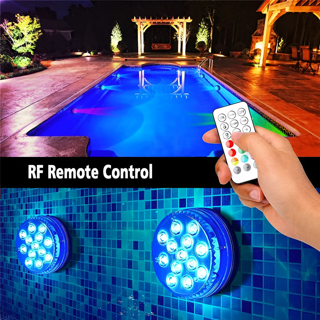 Remote control and a small cylindrical IP68 waterproof diving light with colour changing LEDs for aquariums.