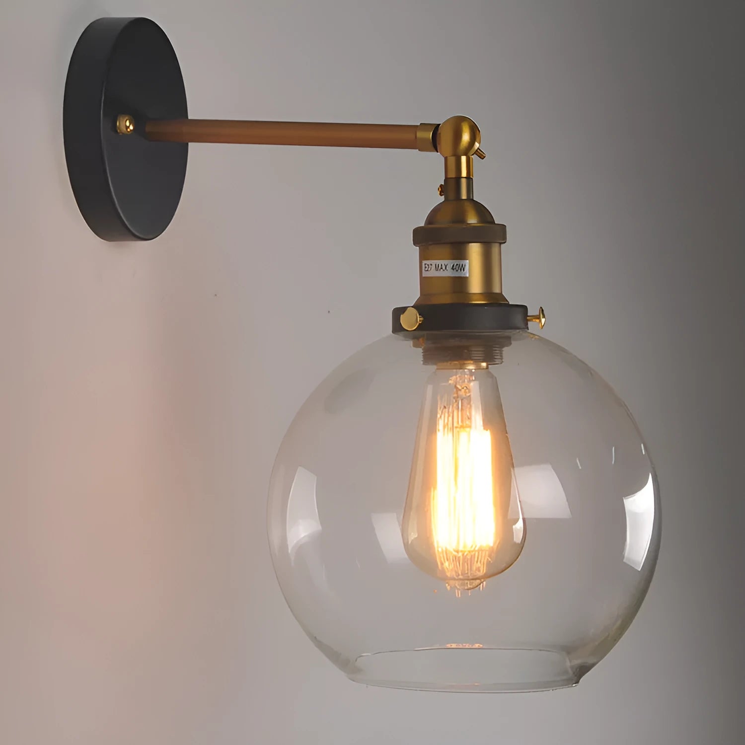 20cm round glass ball wall lamp in amber, smoke grey, or transparent on aluminium holder.