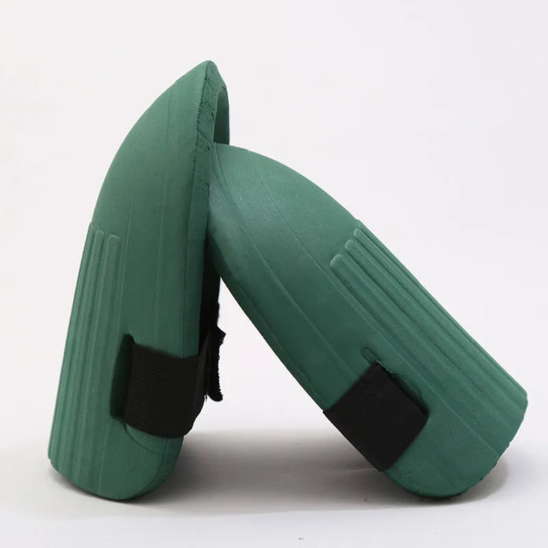 Pair of thick EVA foam knee pads in army green colour for garden work protection.