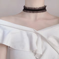 Electroplated alloy necklace with velvet ruffled flower pendant and snake bone chain in three colours.