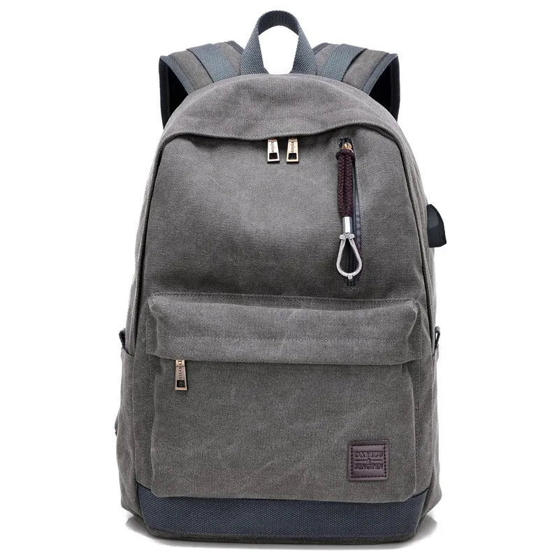 Canvas shoulder backpack with USB charging port in coffee colour showing computer pocket and main compartment