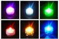 Set of colourful electronic candle lights with CR2032 battery, submersible, 3cm diameter, 2.6cm height, plastic housing