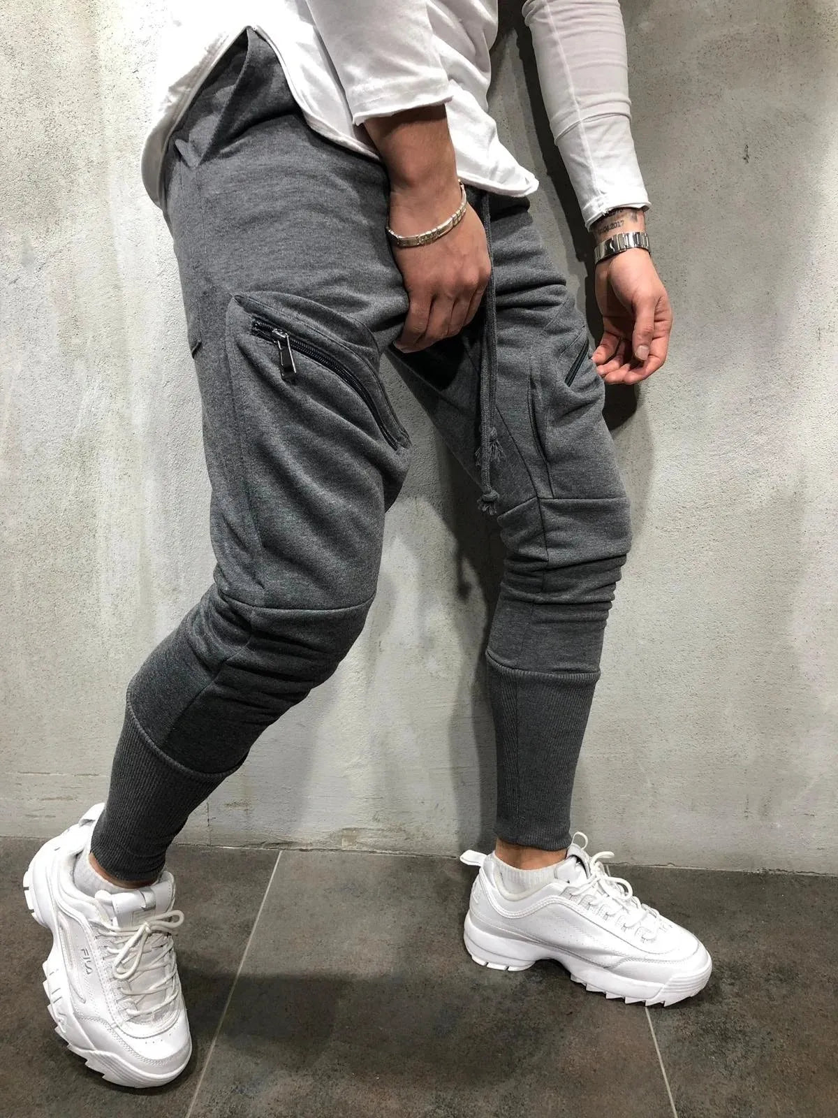 Men's cotton blended micro-elastic zipper casual trousers in black, tapered leg style