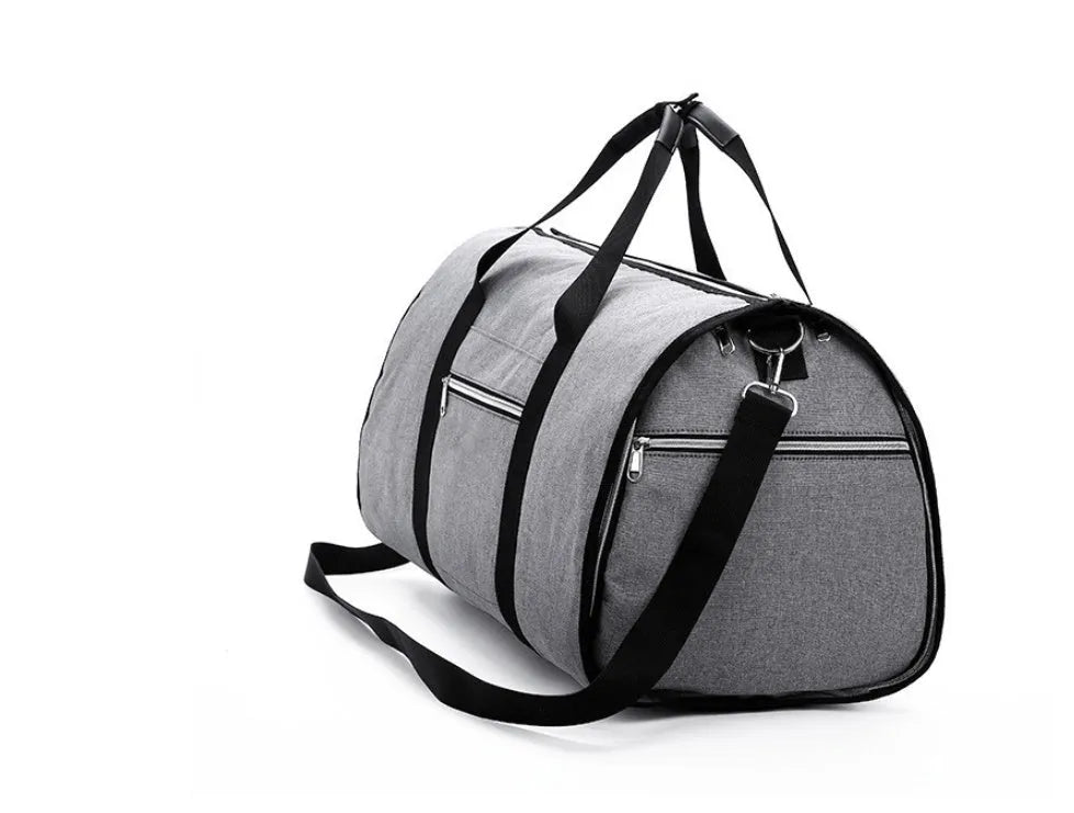 Cylinder-shaped travel bag in Oxford cloth, shown in one of four colours: black, blue, light grey, or red.