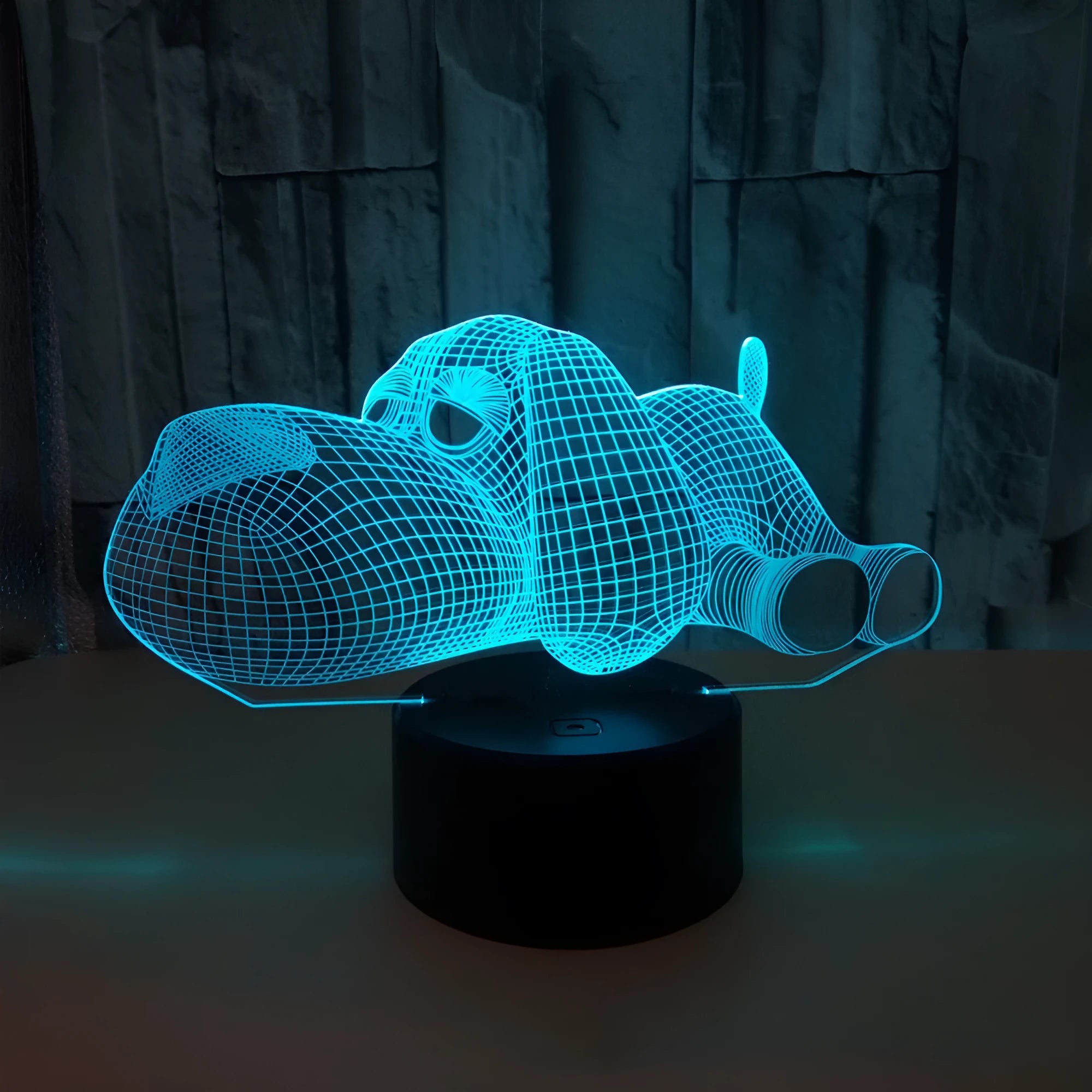 Doggo Desktop Lamp showing 3D illusion dog design with multi-colour illumination