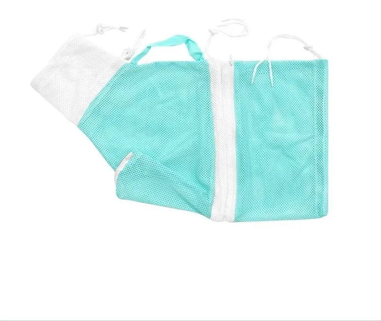 Upgraded 5th generation cat grooming bag in pink and white with integrated nail scissors.