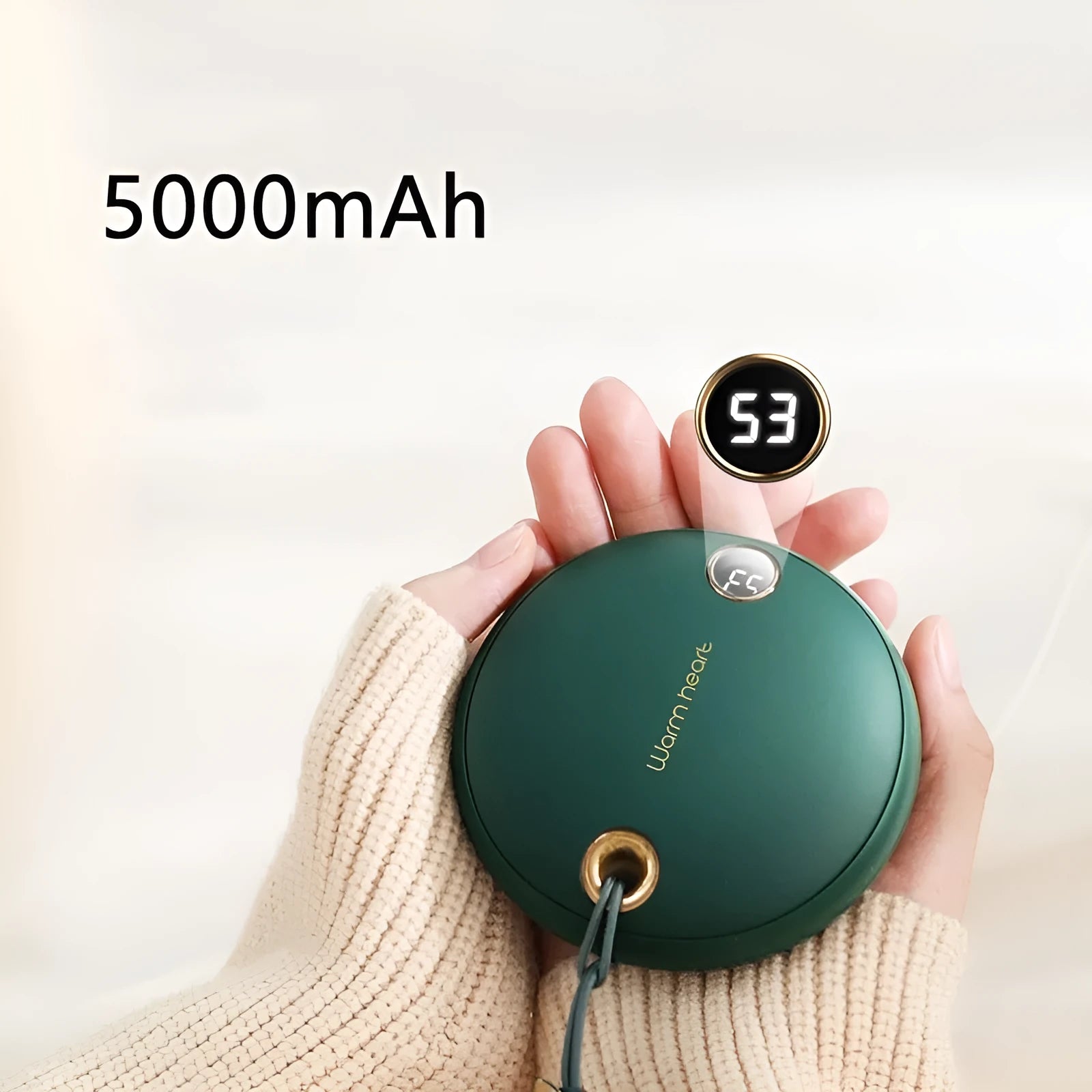 Green hand warmer power bank with digital display showing charge level, measuring 89.5mm square