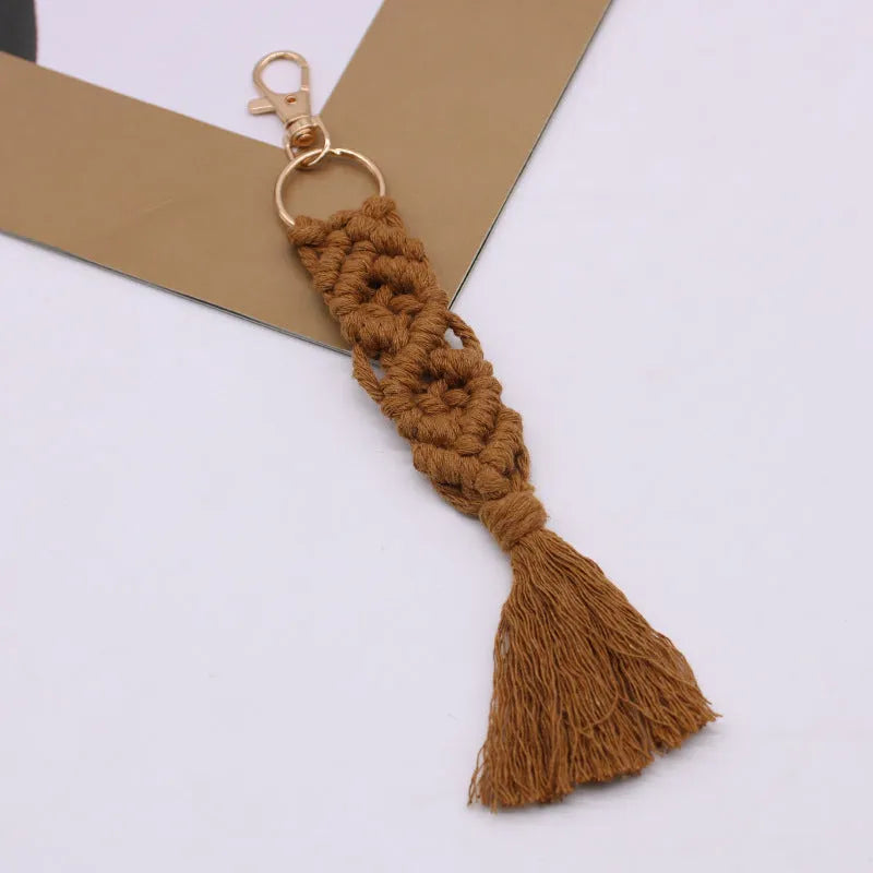 Hand-woven cotton tassel key chain in eight colours including brick red and rose pink for car keys and bag ornaments