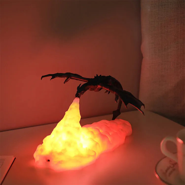 3D-printed red dragon night light with glowing warm light effect on a dark background.