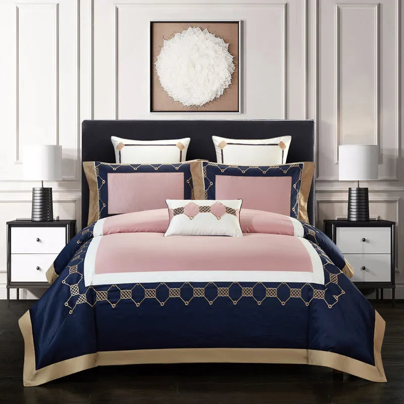 Cotton embroidery bedding set showing satin weave texture and embroidery pattern detail