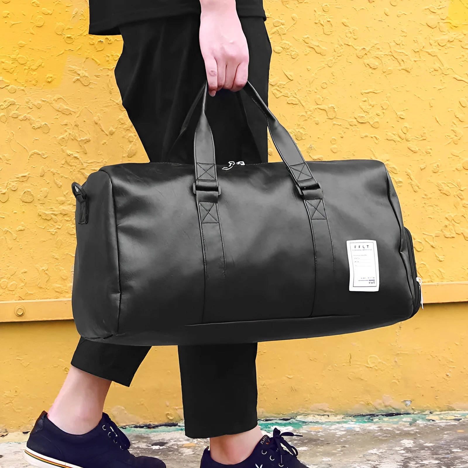 Black waterproof sports bag with separate side shoe compartments shown in large and small sizes.