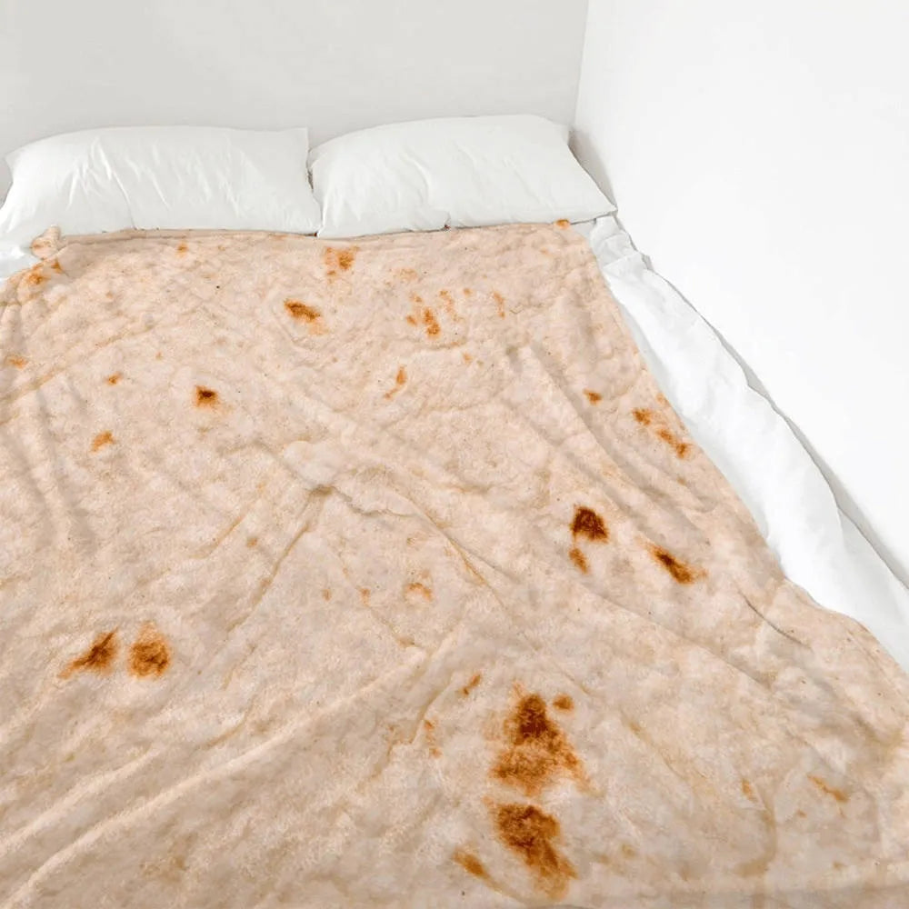 Round and rectangular flannel burrito blankets in various sizes with food-themed print.