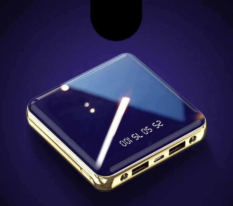 Compact blue portable power bank with 20000mAh capacity and multiple USB ports on a white background.