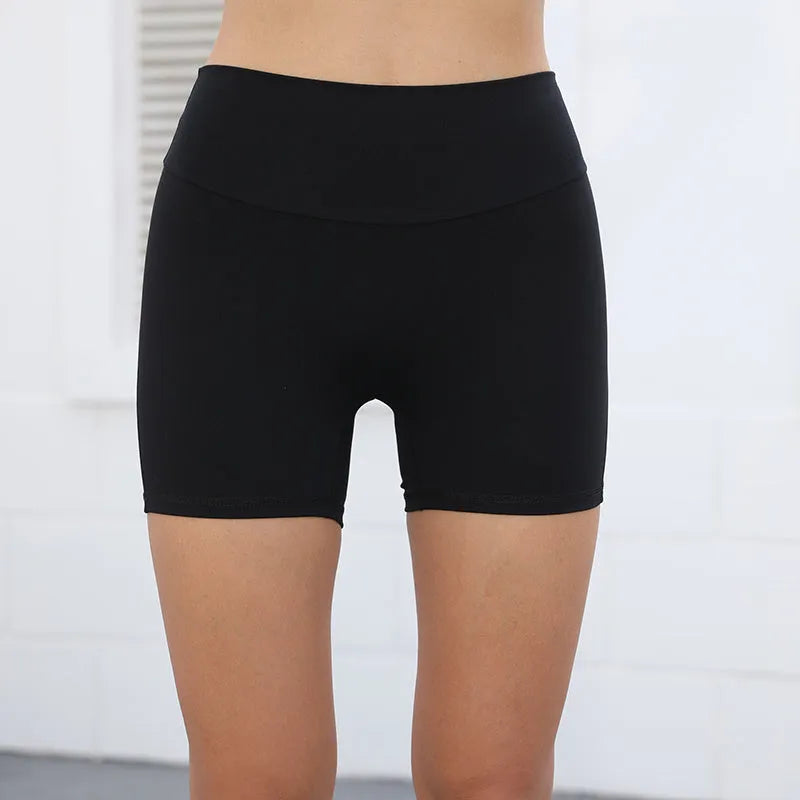 Women's high waist hip lifting shorts with side pockets in quick-dry nylon fabric