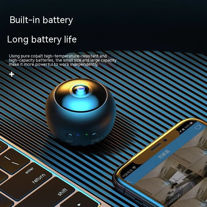 White or black 1080p wireless WIFI security camera with fixed lens on a desk.