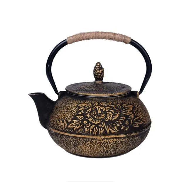 Japanese cast iron teapot in black with Peony pattern, showing lid, handle, and spout.
