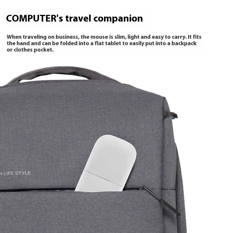 Black folding touch wireless mouse shown both folded and unfolded for portable use.