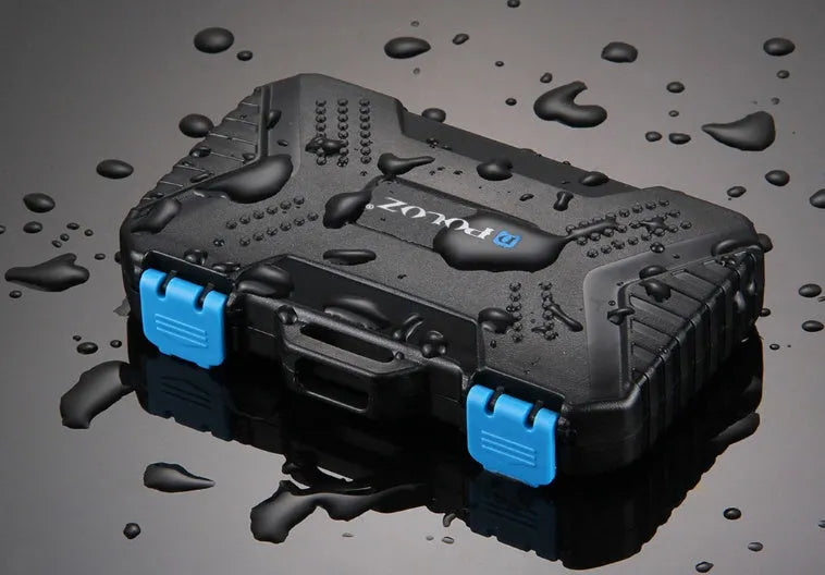 Black waterproof memory card case with ABS polycarbonate body and blue TPV seal, holding multiple cards