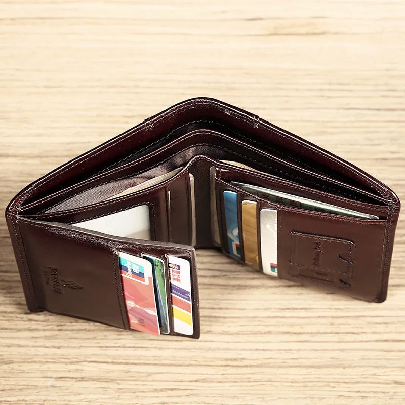 Men's compact leather wallet open showing card slots, change pouch, photo slot, and dark privacy compartment.