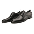 Men's black handcrafted leather derby shoes with a pointed toe and rubber sole.