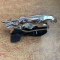 Car Leopard rotating mobile phone bracket in black ABS plastic mounted on dashboard