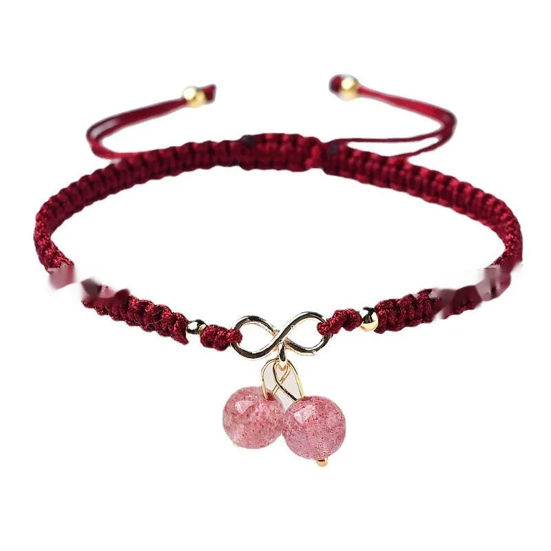 Women's natural strawberry quartz crystal bracelet with cherry charm on adjustable beaded band