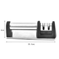 Black hand-held ABS kitchen knife sharpener on a white background.