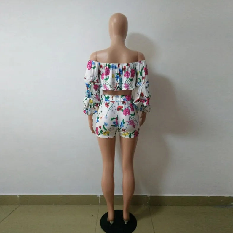 Women's multicolour digital print two-piece set with pile sleeve top and matching shorts.