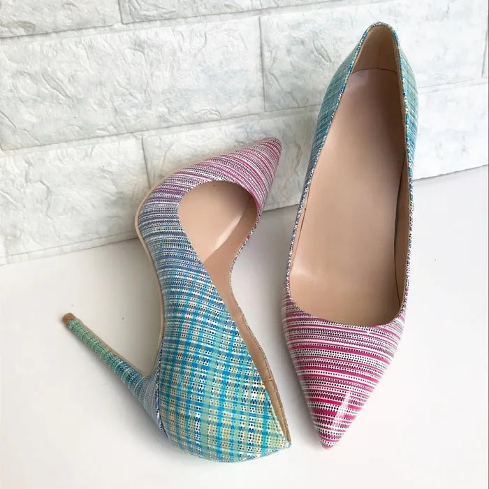Pink and blue gradient patent leather ladies pointed toe high heel shoe with a slender stiletto heel.