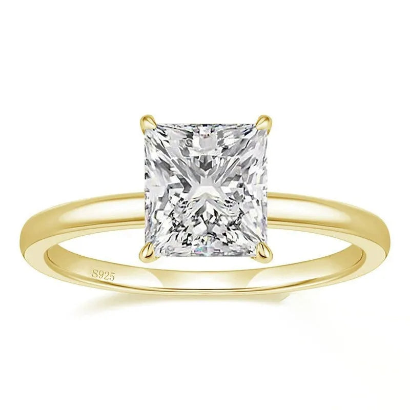 Simple geometric 925 silver ring for women in polished gold, rose gold, or silver finish on a grey background.