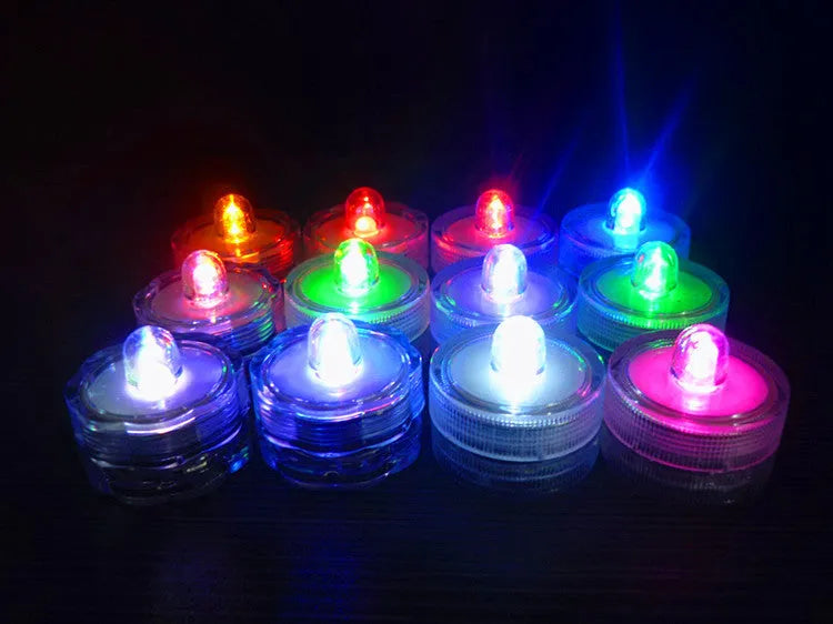 Set of colourful electronic candle lights with CR2032 battery, submersible, 3cm diameter, 2.6cm height, plastic housing