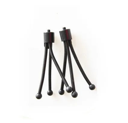 Compact black iron frame mini desktop tripod with a ball head, shown folded and extended next to a smartphone.