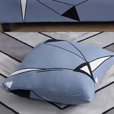 Printed geometric pattern stretch sofa slipcover on three-seater sofa