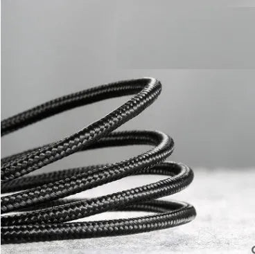 Close-up of a woven grey and black Android micro USB charging and data cable with a choice of lengths.