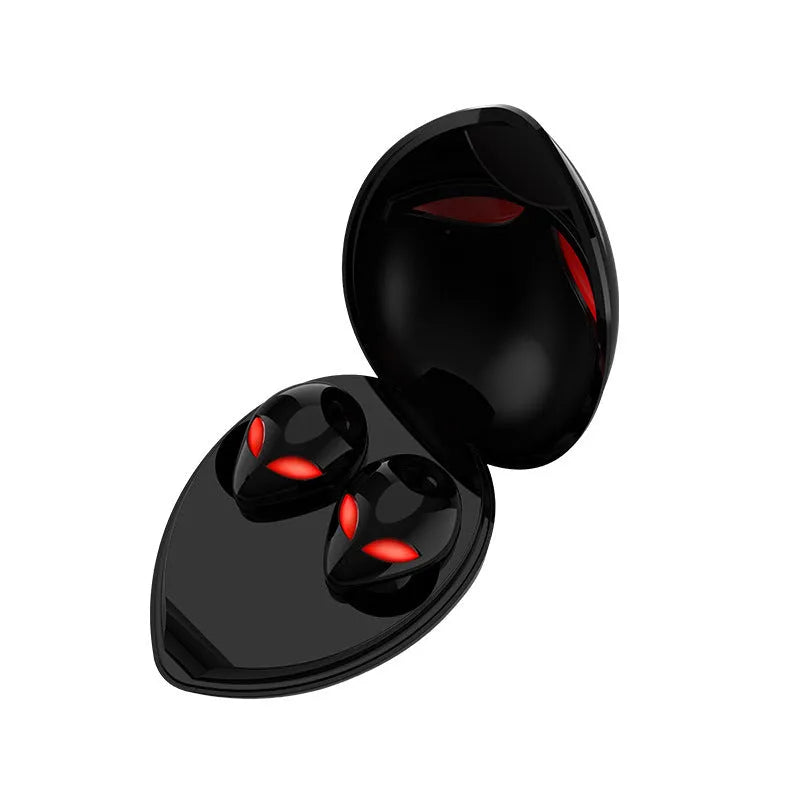 Creative Outer T8 Starman Alien design Bluetooth earbuds with red lighting in charging case.