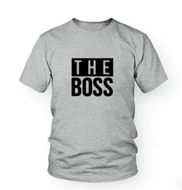 Man wearing a loose fit round neck short sleeve T-shirt with a graphic print design.