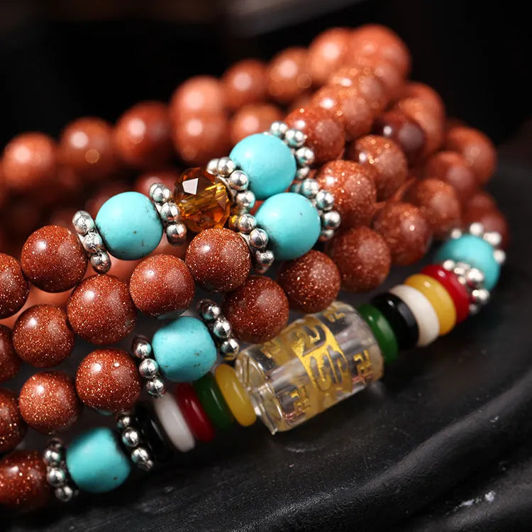Golden Star Stone women's bracelet with 108 nugget sand pieces and fu character mantra beads