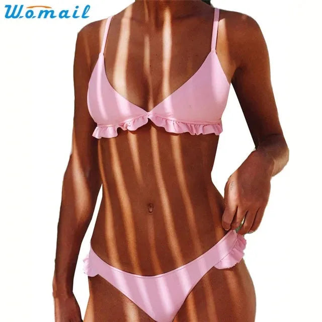 Womail women's push-up padded bra bikini set in white, showing top and bottom on model