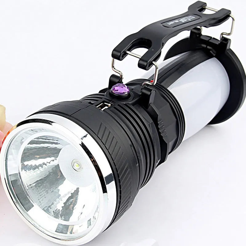 Black solar-powered emergency flashlight with USB charging port