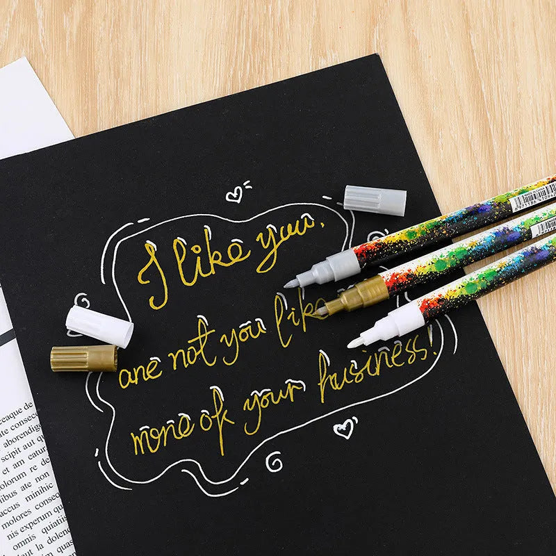 Set of six colourful acrylic graffiti marker pens with 0.7mm tips in plastic packaging