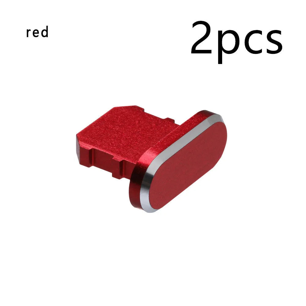 Aluminium alloy dust plug for iPhone charging port in various colours including gold, silver, blue, and rose gold.