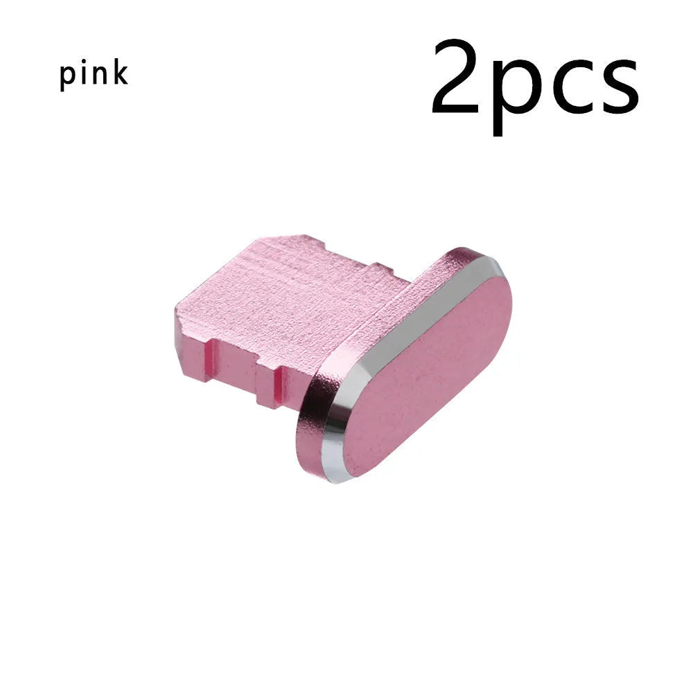 Aluminium alloy dust plug for iPhone charging port in various colours including gold, silver, blue, and rose gold.