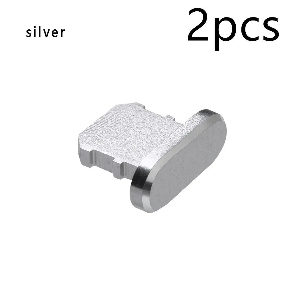 Aluminium alloy dust plug for iPhone charging port in various colours including gold, silver, blue, and rose gold.