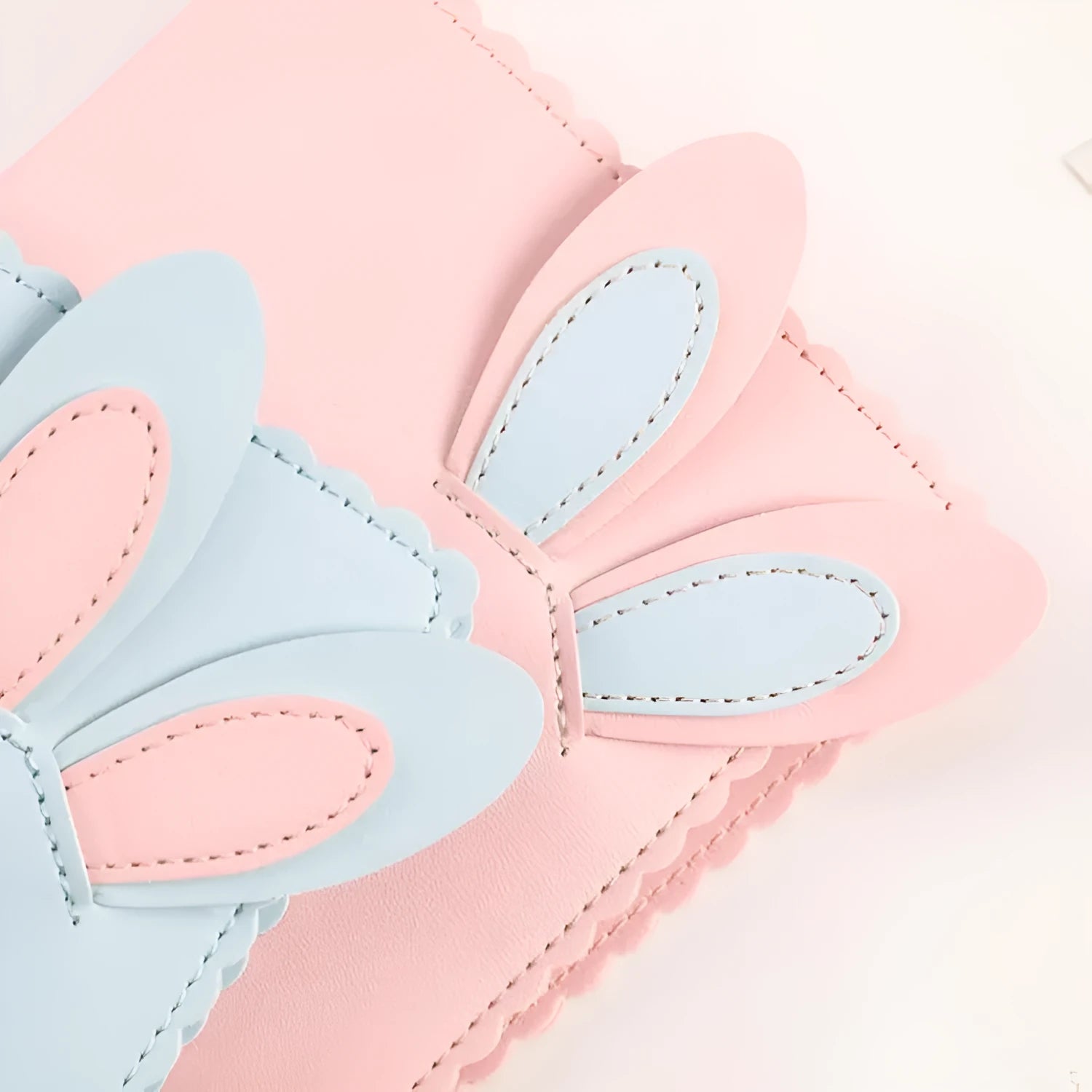 Cute bunny style mini photo album in pink, blue, or white with 16 loose-leaf pages for 3-inch photos.